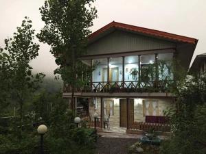 اقامتگاه بوم گردی نارون رستم آباد اقامتگاه بوم گردی نارون رستم آباد