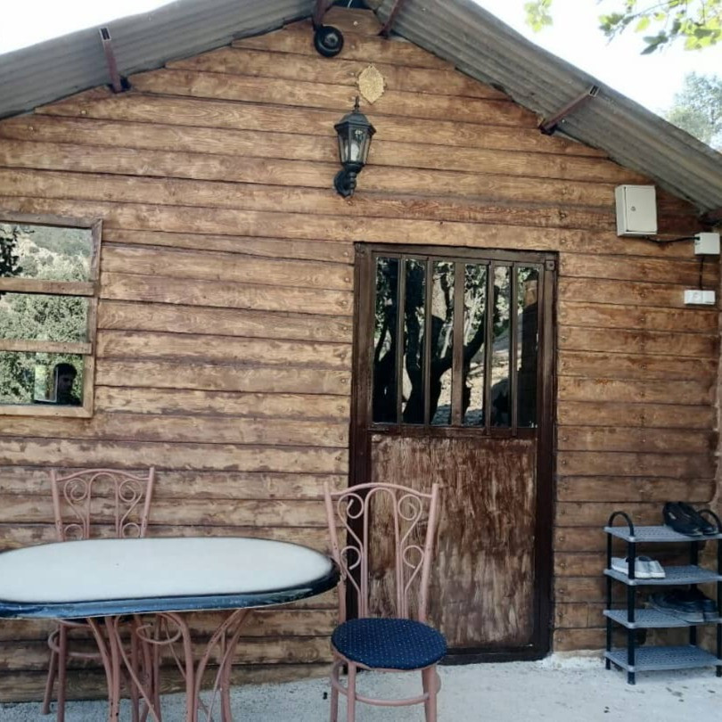 پشتیبانی آنلاین اقامتگاه بومگردی کلبه چوبی ایلام